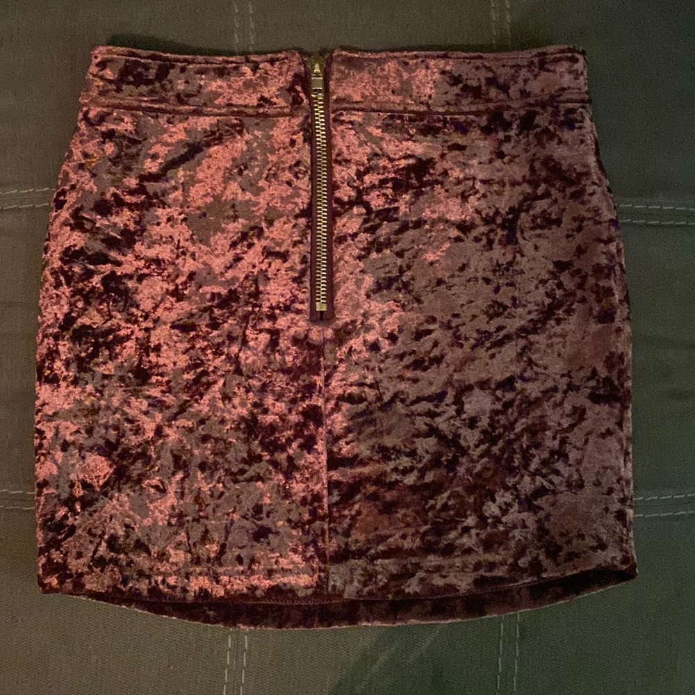 Brand Forever21, size medium, velvet purple, vips in front.